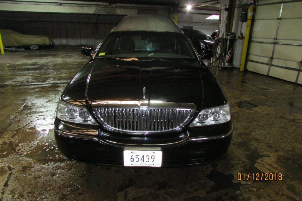 low miles 2009 Lincoln Town Car Superior hearse